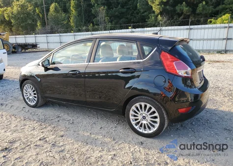 2014 Ford Fiesta Titanium z USA, uszkodzony, nr VIN 3FADP4FJ5EM225285